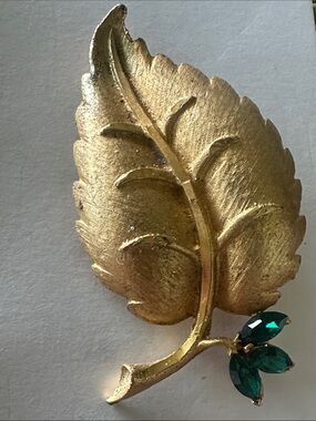 Gold Leaf Brooch with Green Marquise Stones